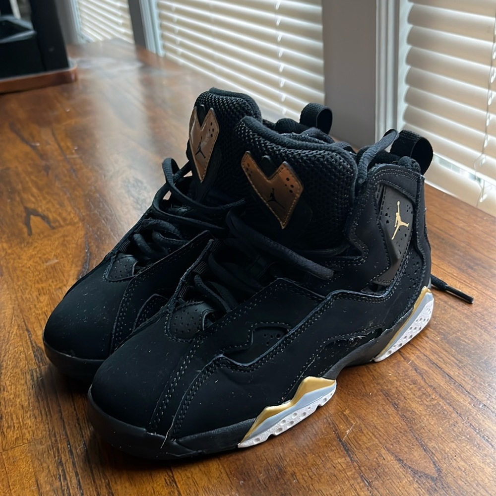 Black Jordan’s in a size 13 for kids only has been worn once.